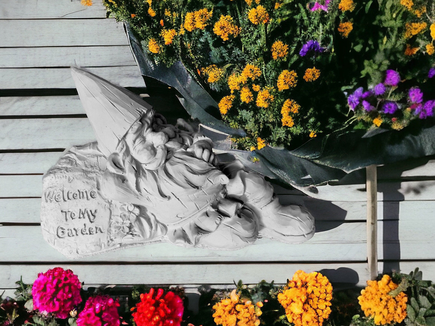 Lazy Garden Gnome on a Welcome Sign Statue